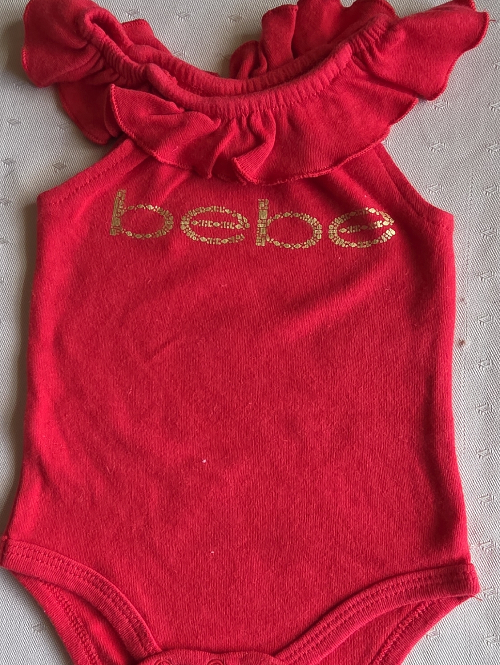 bebe Red Ruffle Neck Bodysuit with Gold Logo